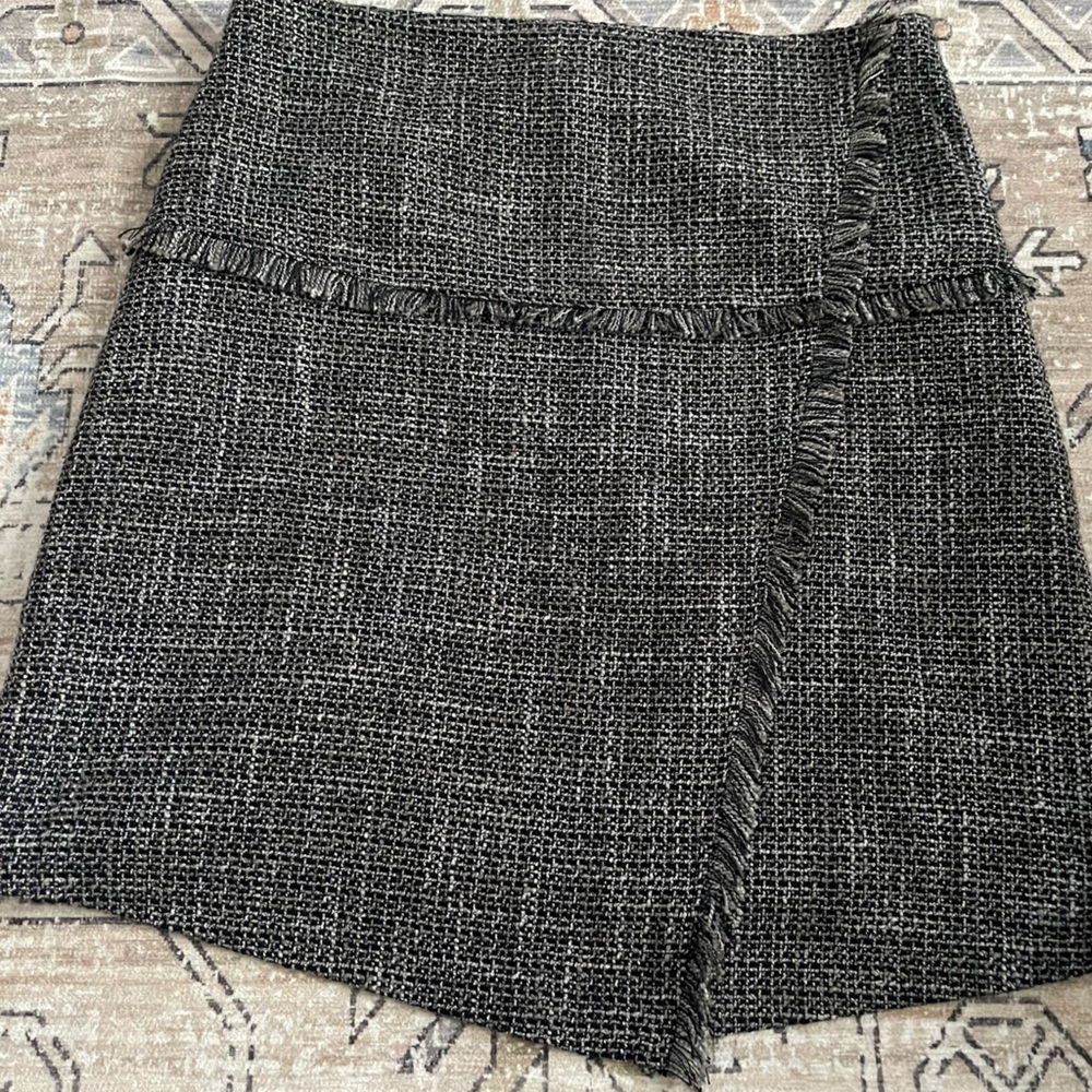 Halogen black skirt with fringe.